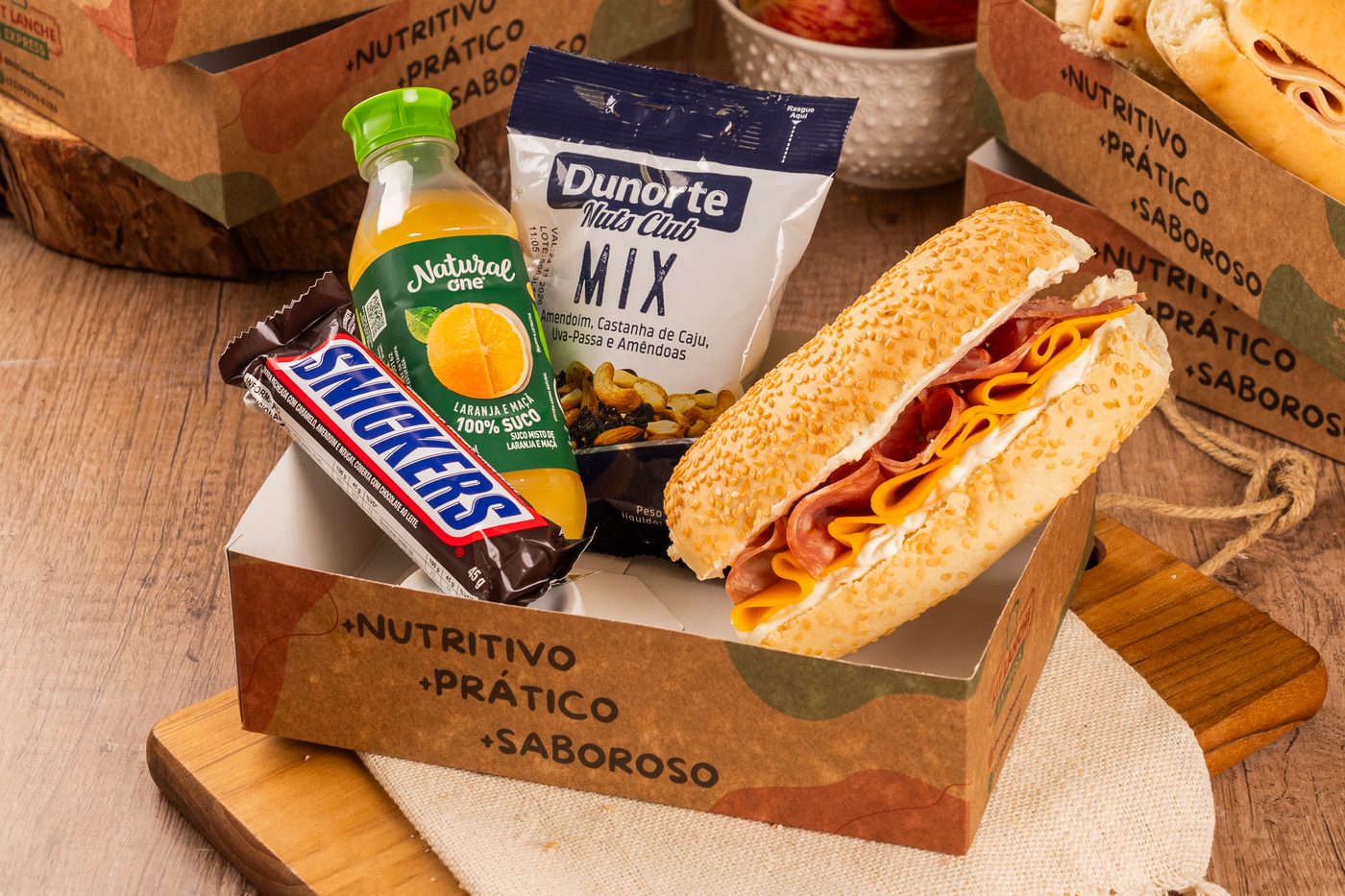 Kit Select Mix: baguete gergelim com salame e cream cheese, suco Natural One e mix de castanhas
